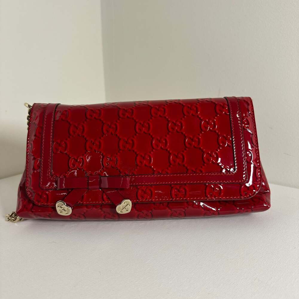 Gucci Shoulder Bag Enamel Red GG Monogram with gold hardware